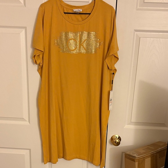 Calvin Klein Gold Logo Mustard Dress
NWT - Picture 4 of 7